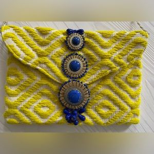 Vibrant yellow and blue clutch/shoulder bag with blue, silver and gold detail.